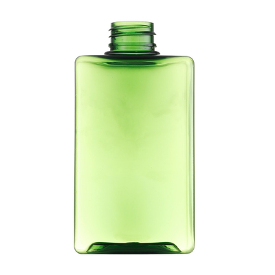 A garrafa de empacotamento cosmética transparente do verde do quadrado pode ser combinada com os tampões diferentes